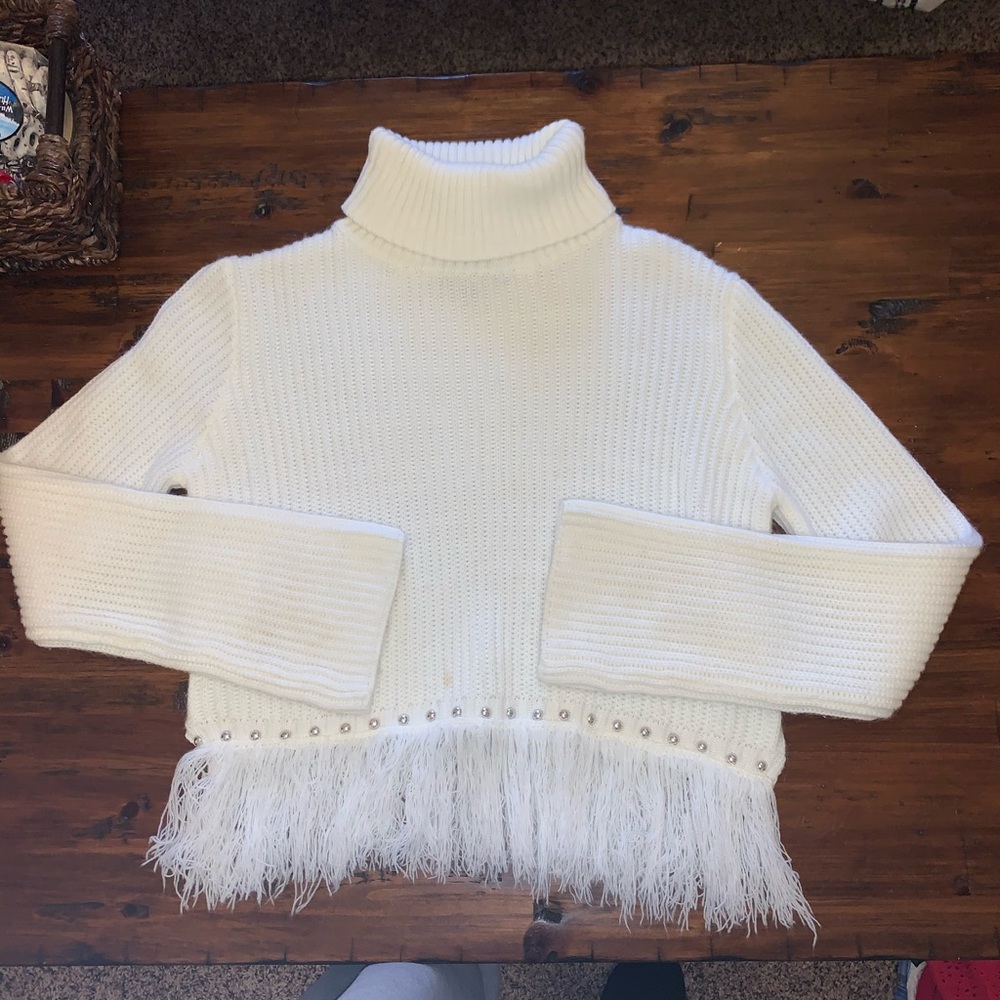 White turtleneck sweater